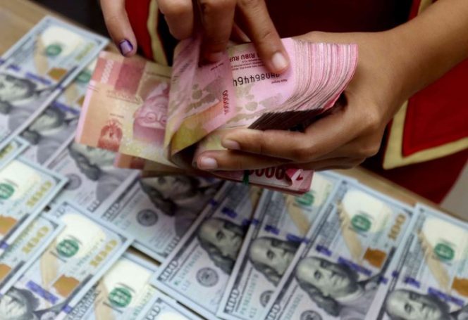 
 Rupiah Stagnan di Rp17.337 per Dolar AS, Berpeluang Menguat Terbatas